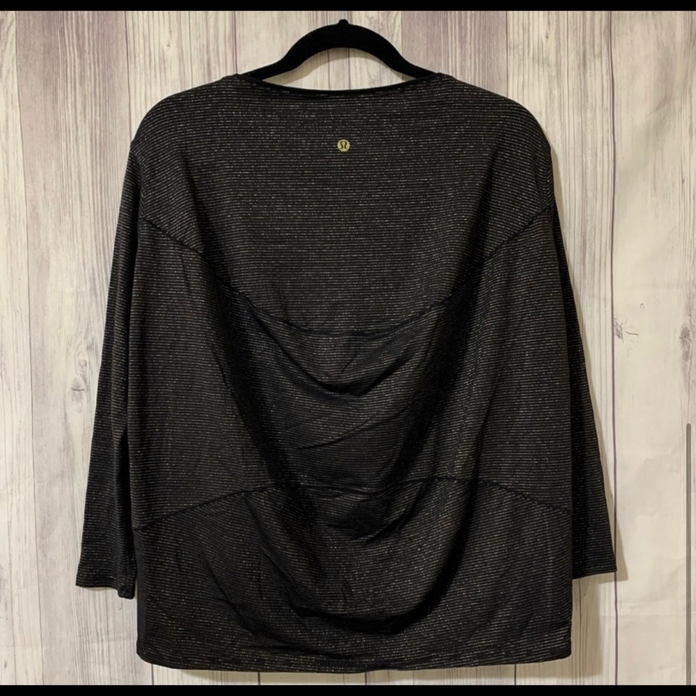 Lululemon Back In Action LS Shine long sleeve striped athletic top.